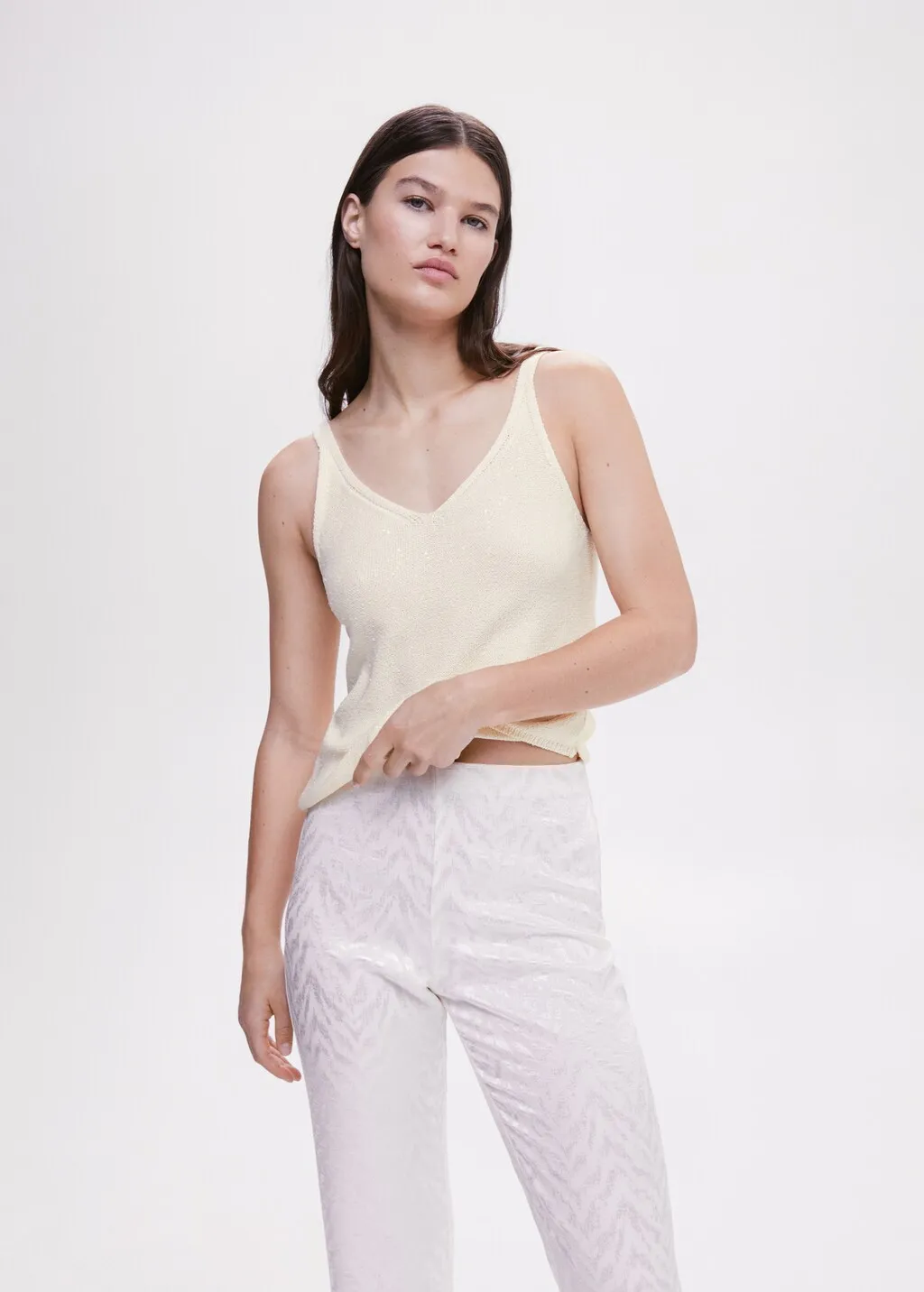 Top maglia dettaglio paillettes